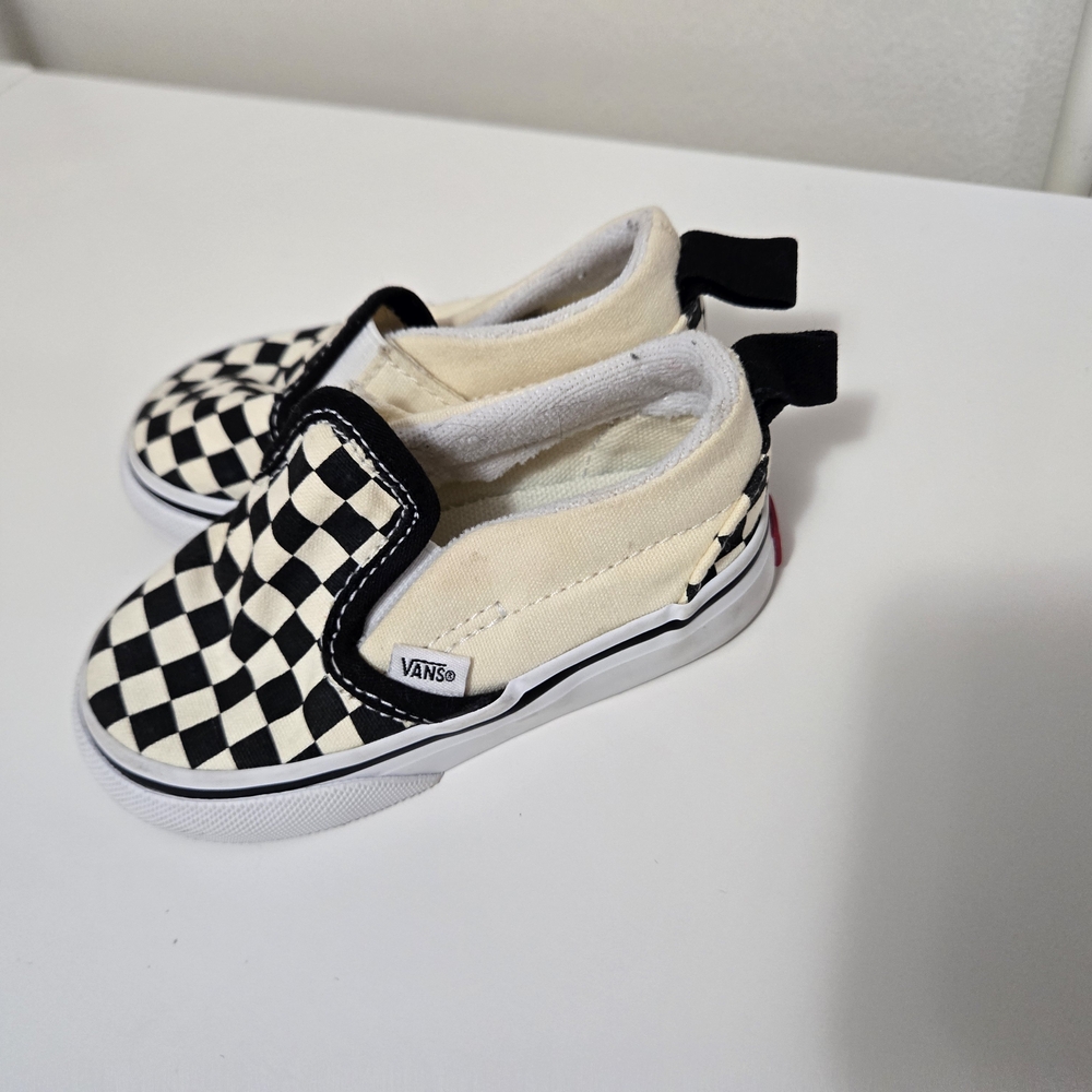 Vans Black and White Checkerboard Slip-On Sneakers